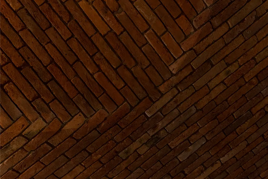 Close-up of the antique brick vault: different tones spread evenly across the surface — Giusti Wine barrel room, Italy