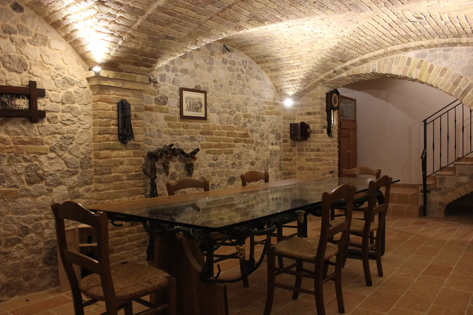 Authentic reclaimed antique brick vaulted ceiling with genuine patina and natural stone walls — private home, Flumignano, by Pietrantiche