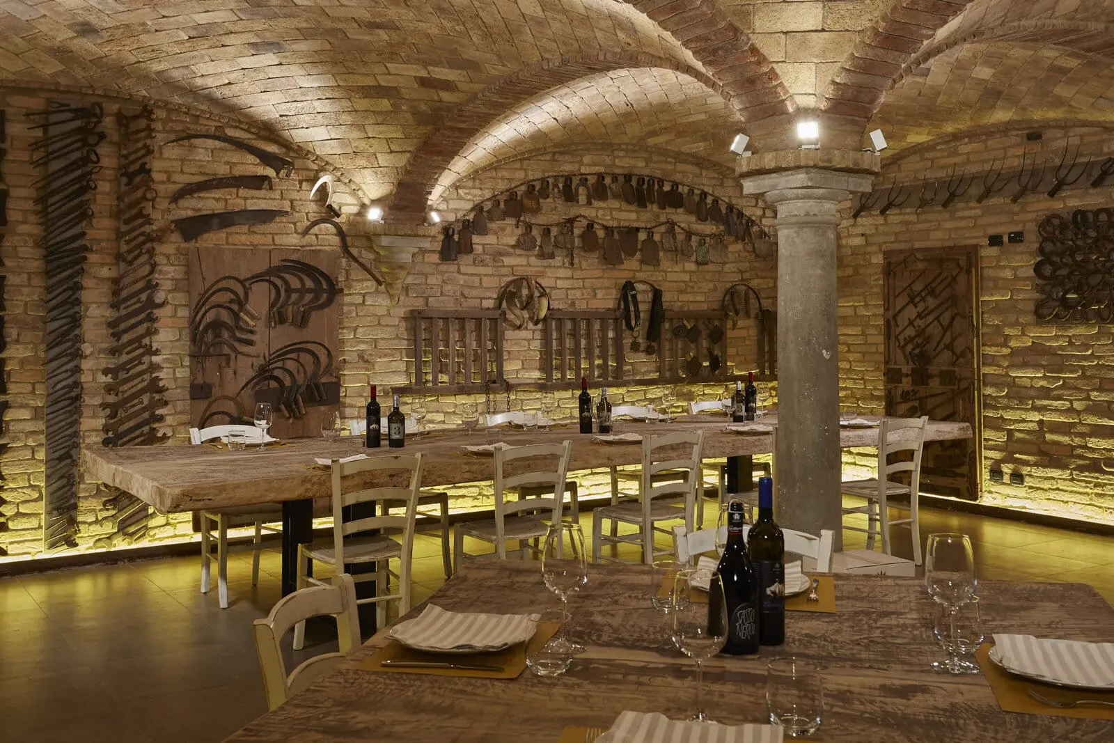 High-end rustic Italian restaurant featuring bespoke antique brick sail vaults, creating a deeply authentic and elegant dining atmosphere.